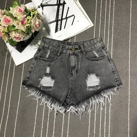Nuovi pantaloncini di jeans spezzati con nappa a vita alta femminile 2026 versione coreana estiva bordo grezzo gamba larga pantaloncini di jeans larghi taglie forti donna