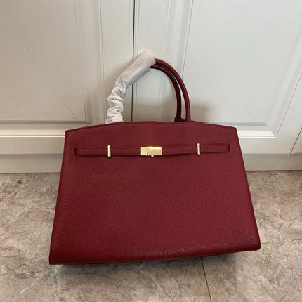 Borsa a mano di lusso in pelle martellata con chiusura in metallo, manico rigido, borsa professionale per affari e cerimonie