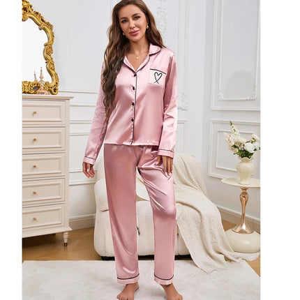 Vestiti per la casa delle donne Pigiama in raso Autunno Tasca a maniche lunghe Ricamo a forma di cuore Top e pantaloni Pigiama Femme Loungewear Pj Set
