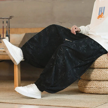 Pantaloni di alta qualità per uomo stile cinese fiore scuro velluto a coste Bloomers casual elastico in vita moda pantaloni larghi a gamba larga maschile