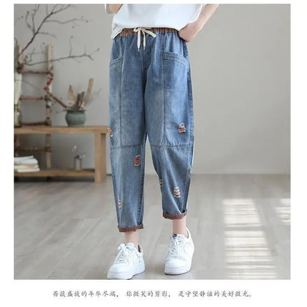 Jeans Strappati a Nove Punti da Donna, Nuovi Pantaloni Harem Casual Sottili con Vita Elastica, Lunghi alla Caviglia, in Denim, per l'Estate 2026