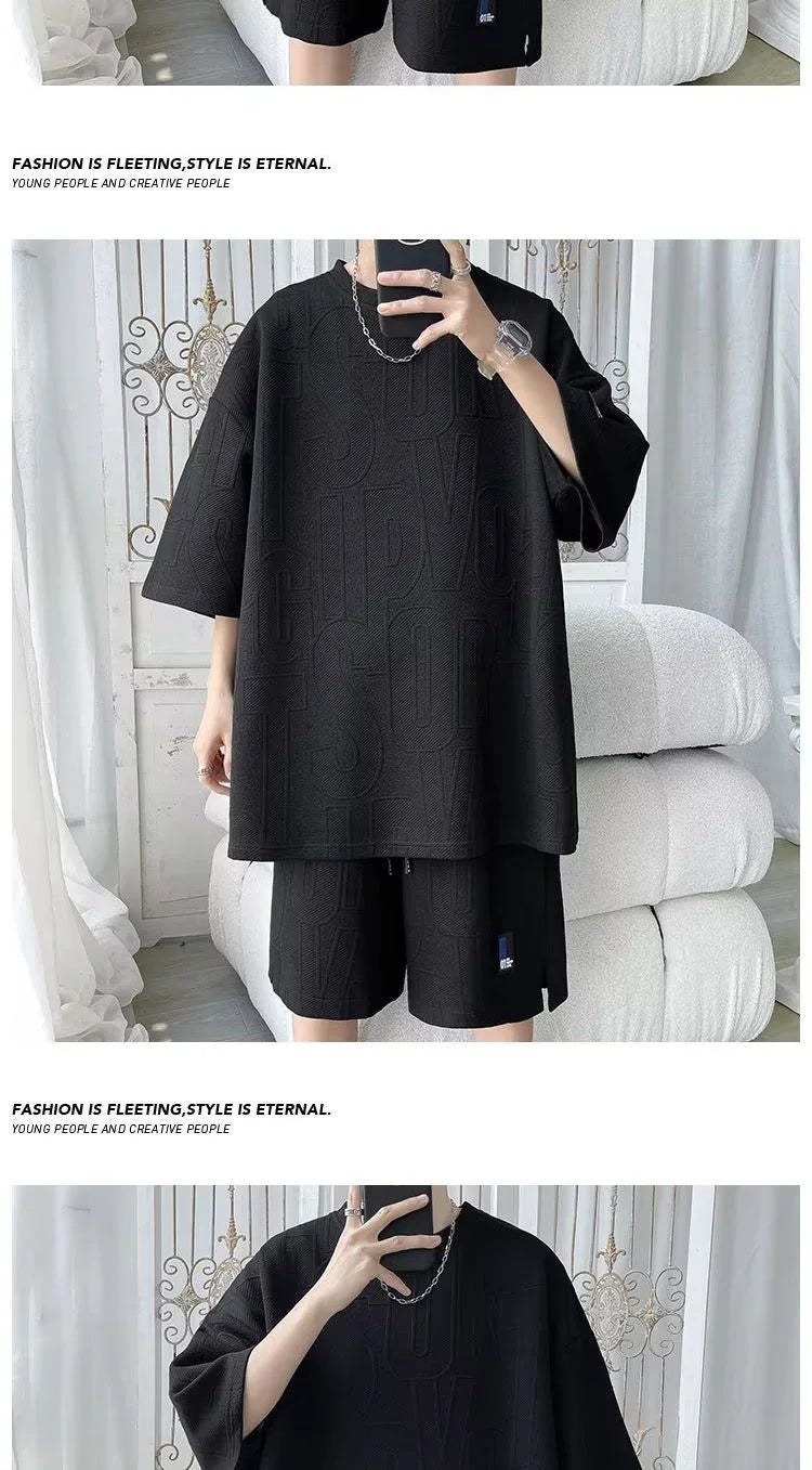 Abito di moda maschile bello set con pantaloncini a maniche corte jacquard sportivi casual larghi Set da due pezzi 2025 Primavera ed estate platinumshop