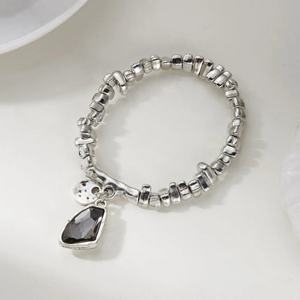 Set di bracciali con collana con pendente in cristallo grigio irregolare semplice barocco Set di gioielli con perline color argento estetico delicato per donna uomo platinumshop