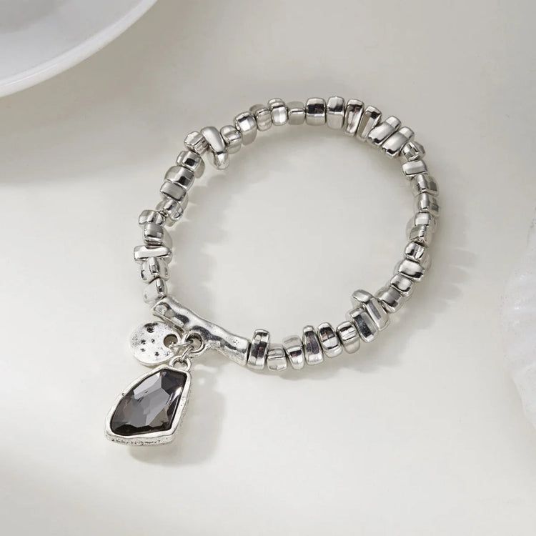 Set di bracciali con collana con pendente in cristallo grigio irregolare semplice barocco Set di gioielli con perline color argento estetico delicato per donna uomo platinumshop