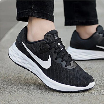 Nike Revolution 7 Sneakers sportive casual unisex in rete traspirante e confortevole DC3729-003 platinumshop