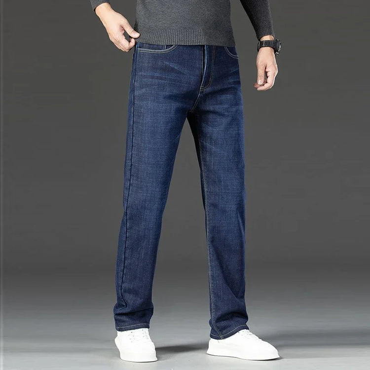 2026 Winter Thermal Stretch Jeans Men New Loose Straight Leg Casual Trousers Male Daily Commute Windproof Denim Pants