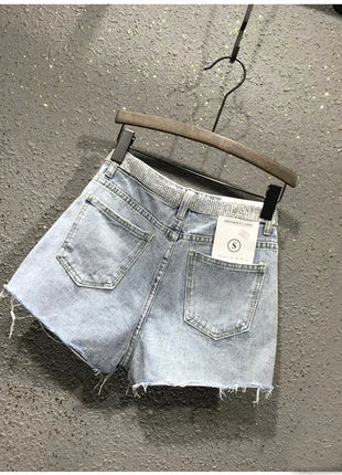 Pantaloncini di jeans bianchi blu irregolari strappati con nappe con strass a vita alta da donna estivi Pantaloncini di jeans coreani da donna