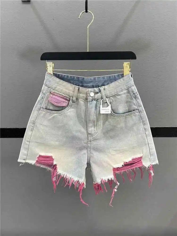 Pantaloncini di jeans con foro rosa stile coreano Donna Estate Nuova vita alta Bordo grezzo A-line Pantaloncini per ragazze calde Pantaloni caldi sottili di nicchia di moda
