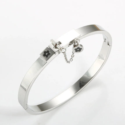 Set di gioielli di moda di lusso in acciaio inossidabile Set di gioielli da donna dorati Bracciale con ciondolo a forma di fiore Anelli per uomo Set di gioielli da donna regalo platinumshop