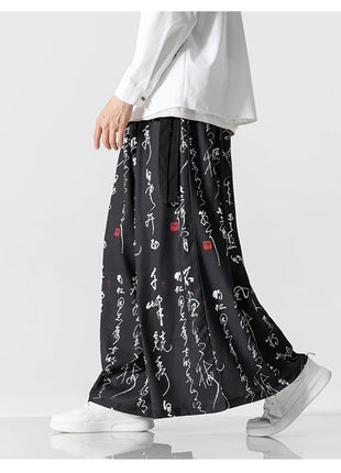 Pantaloni a gamba larga da uomo Ukiyo-e Stampa Pantaloni larghi in vita elastica Uomo Streetwear Giappone Samurai Pantaloni casual Pantaloni lunghi vintage