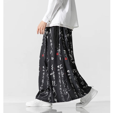 Pantaloni a gamba larga da uomo Ukiyo-e Stampa Pantaloni larghi in vita elastica Uomo Streetwear Giappone Samurai Pantaloni casual Pantaloni lunghi vintage