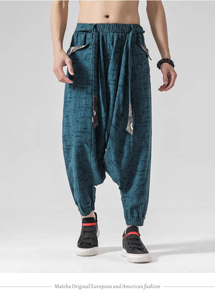 Pantaloni a gamba larga da uomo in cotone e lino casual oversize Harajuku pantaloni alla moda da uomo samurai giapponese retrò Ukiyo-e stampa pantaloni con cintura da uomo