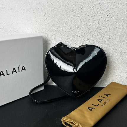 Borsa a tracolla da donna alla moda, a forma di cuore, in vera pelle, morbida e liscia, leggera, casual, per esterni, con scomparti interni.