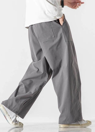 Pantaloni estivi da uomo a gamba larga Pantaloni moda casual solidi leggeri e sottili Harun Pantaloni da jogging larghi da uomo Pantaloni cargo Streetwear Taglie forti 5XL